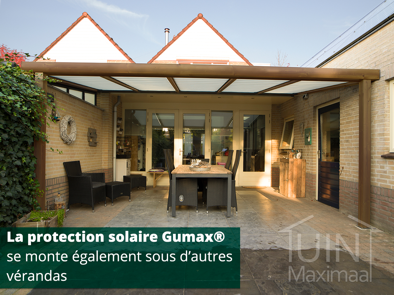 une protection solaire Gumax® sous une véranda qui n’est pas de Gumax®